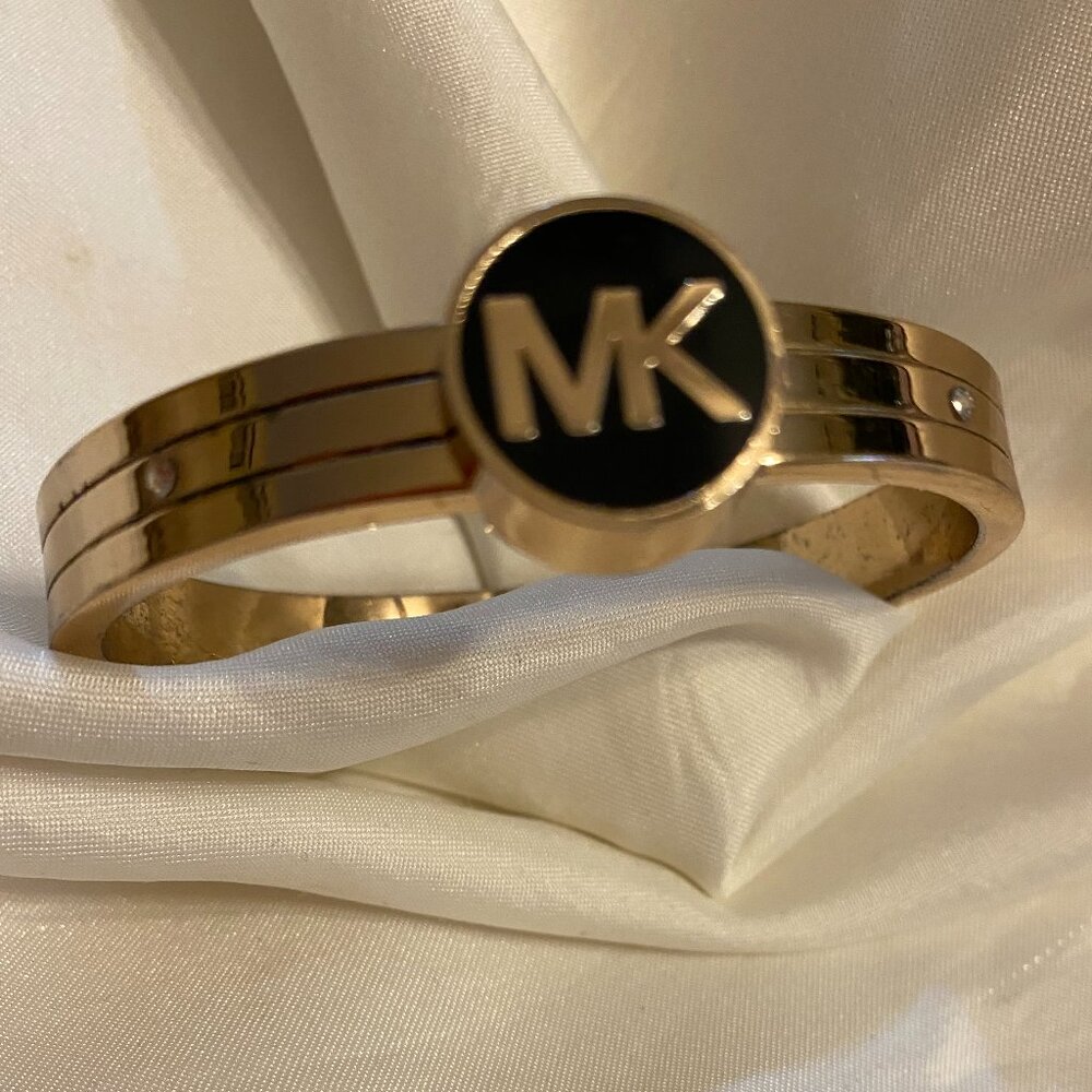 Michael Kors Gold Tone Hinged Logo Bracelet